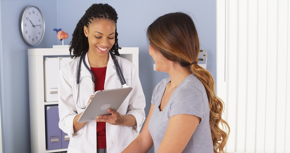 doctor talking with patient