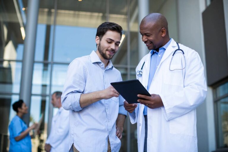 doctor and patient with technology