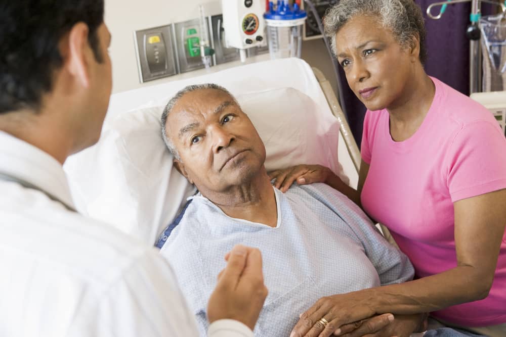 senior man in long-term acute care hospital bed