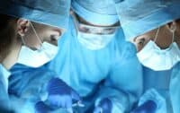 3 surgeons in operating room