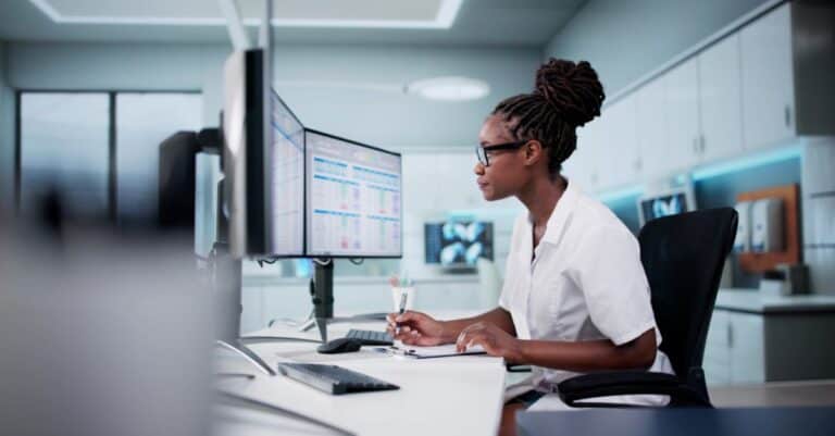 Person learns about the impact of accurate clinical documentation on revenue integrity from Harmony Healthcare