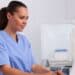 Person implementing Harmony Healthcare's tips for a successful OP CDI program