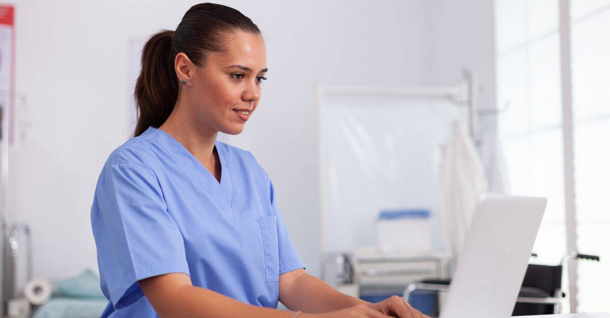 Person implementing Harmony Healthcare's tips for a successful OP CDI program