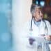 Someone reading Harmony Healthcare's insights on the future of oncology data management