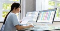 Medical coder using AI to help with medical coding after reading Harmony Healthcare's article