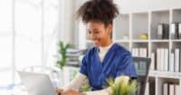 Someone using AI in their revenue cycle processes after reading Harmony Healthcare's article