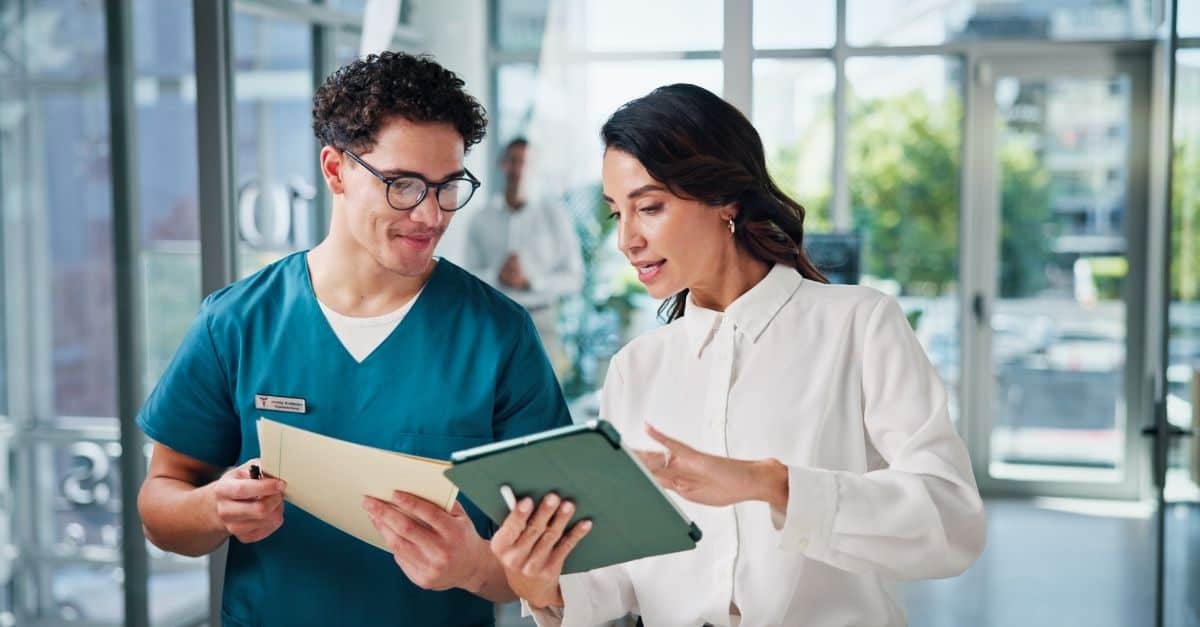 Hospital organization employees discussing if they should hire permanent or contract case managers after reading Harmony Healthcare's article