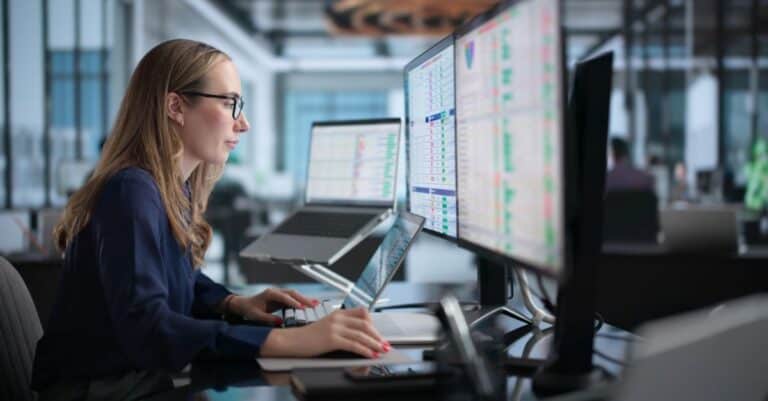 Someone inputting new medical code update after Harmony Healthcare's coding webinar